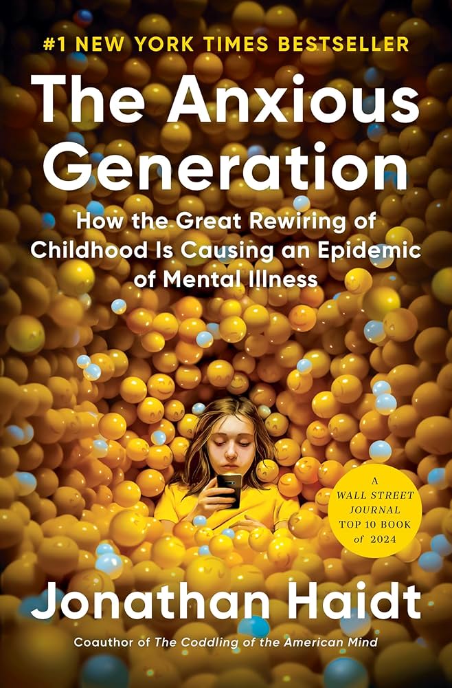 Book cover of "The Anxious Generation" by Jonathan Haidt. The background shows a child sitting in a pit filled with yellow and orange plastic balls, looking down at a smartphone. The title reads, "The Anxious Generation: How the Great Rewiring of Childhood Is Causing an Epidemic of Mental Illness." A yellow badge on the right highlights it as a Wall Street Journal Top 10 Book of 2024. The author’s name, Jonathan Haidt, appears at the bottom.